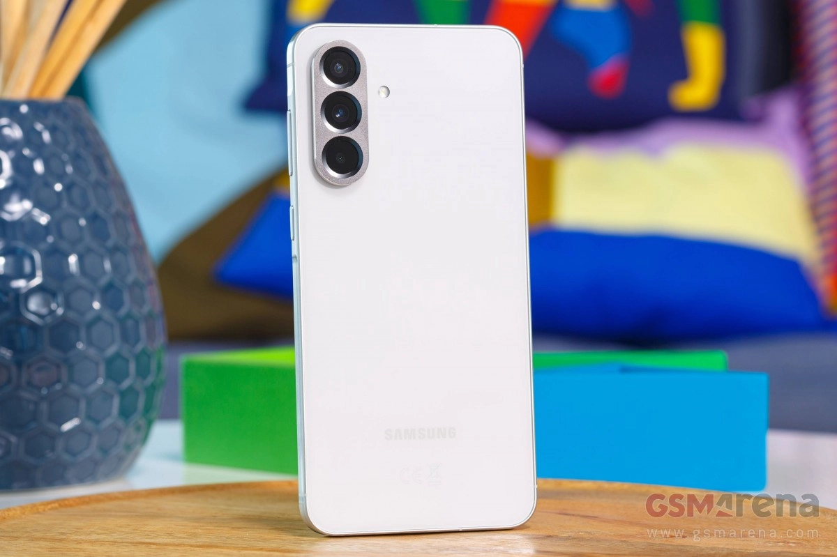 Samsung Galaxy A57 white back with triple camera.