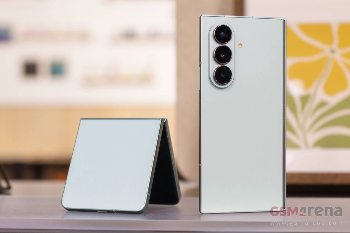 Two Samsung foldable phones, one open.