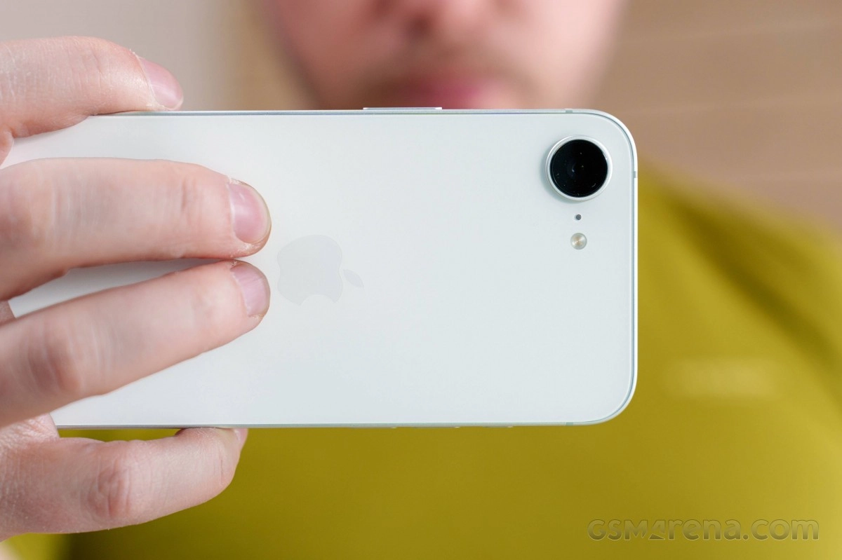Close up of white iPhone with Apple logo