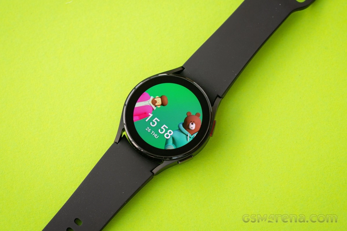 Samsung Galaxy Watch4 shows cartoon characters on screen.