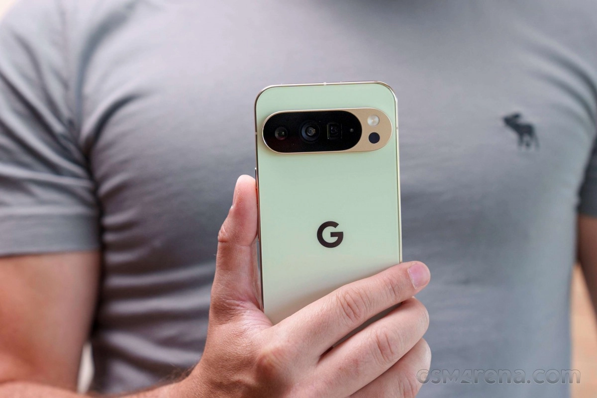 Google Pixel phone held by hand.