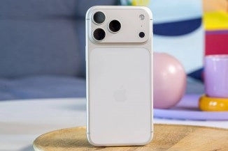 White smartphone with triple camera system.