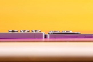 Close up of two smartphones' camera lenses.