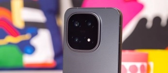 Grey smartphone back with quad camera module.