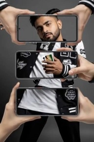 Model holding Ai+ NovaFlip smartphone, framed by phones.