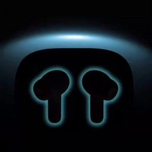 Ai+ NovaFlip glowing earbuds in dark case.